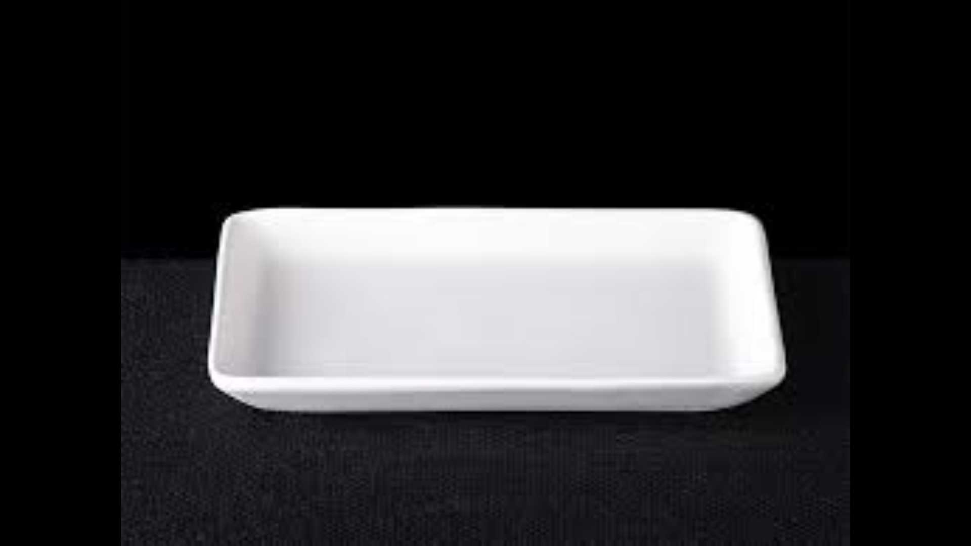 A rectangular plate with a flat side and edge