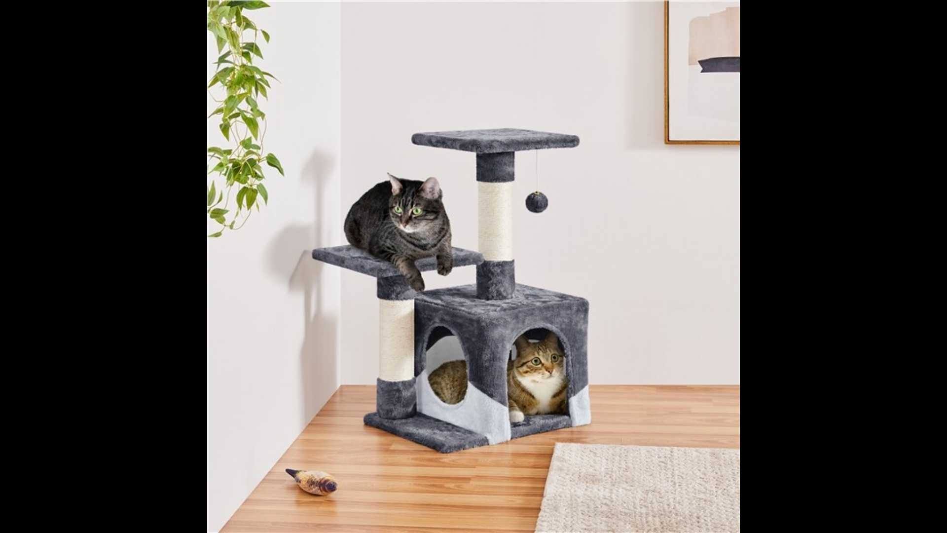 A small cat tower with a scratching post.