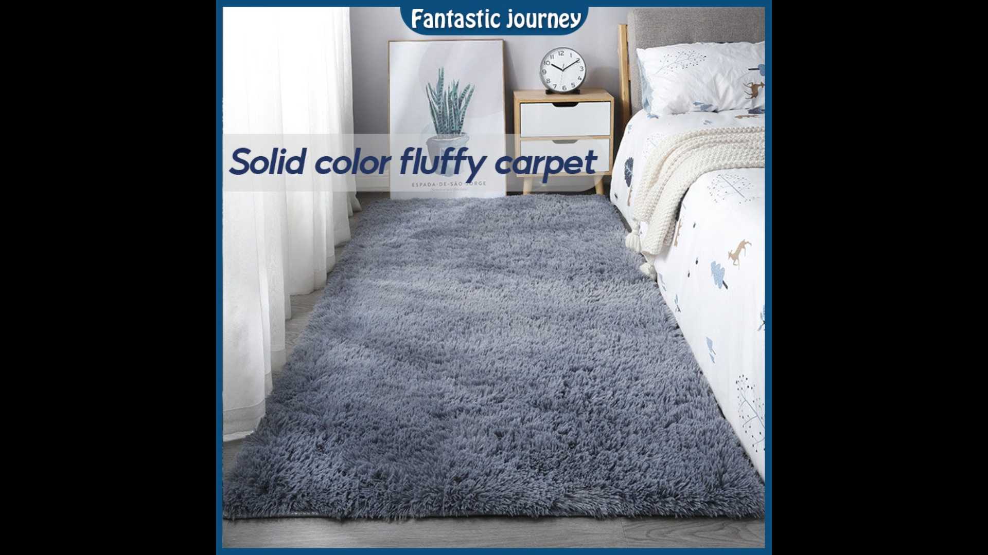 Small fluffy carpet measuring 200cm * 300cm.