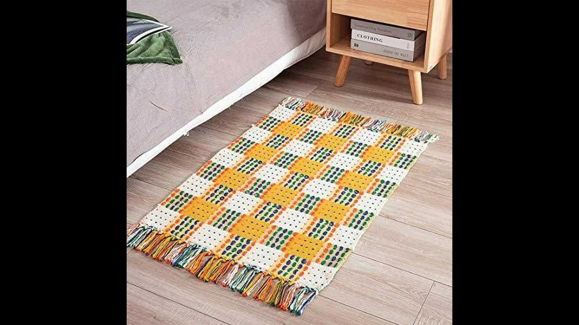 Fennco Styles boho style rug, multicolor, plaid, hand-woven, with tassels, for small spaces.