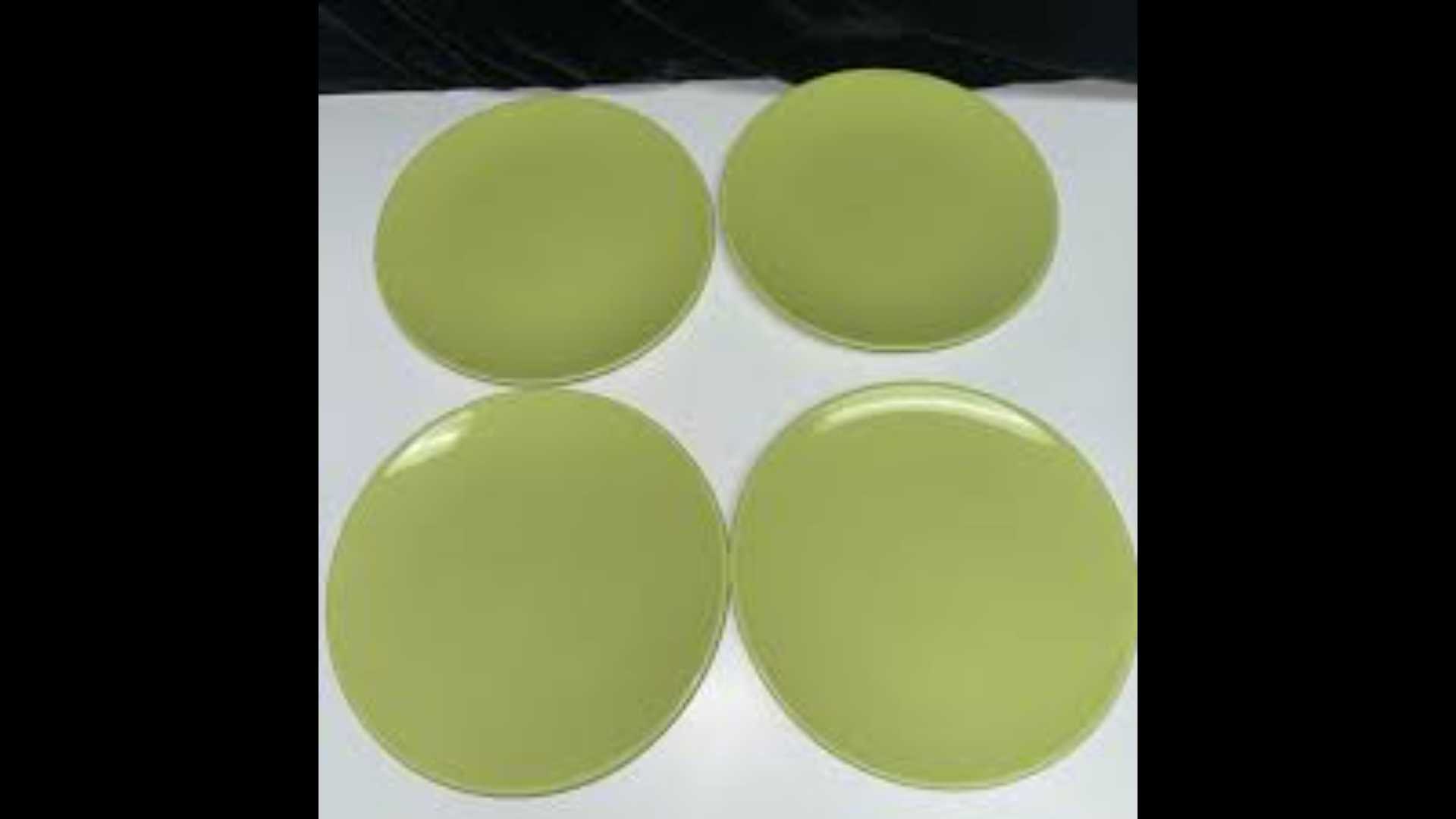 Ikea dinnerware set from Sweden: 4 dinner plates, olive green.