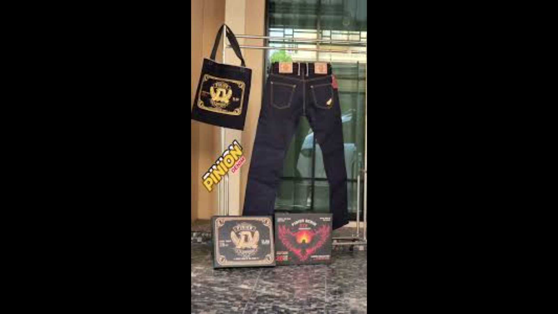 Pinion denim trousers, a denim bag and a box dedicated to the brand's 8th anniversary.