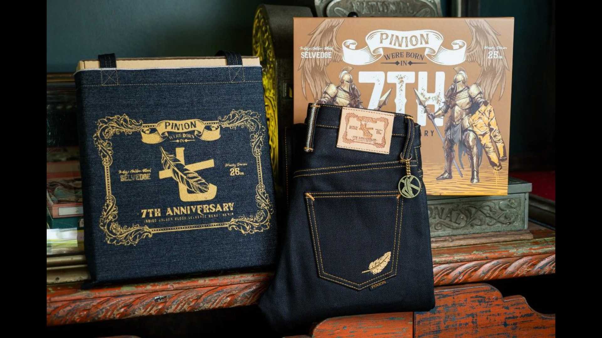 Pinion denim trousers, a denim bag and a box dedicated to the brand's 7th anniversary.