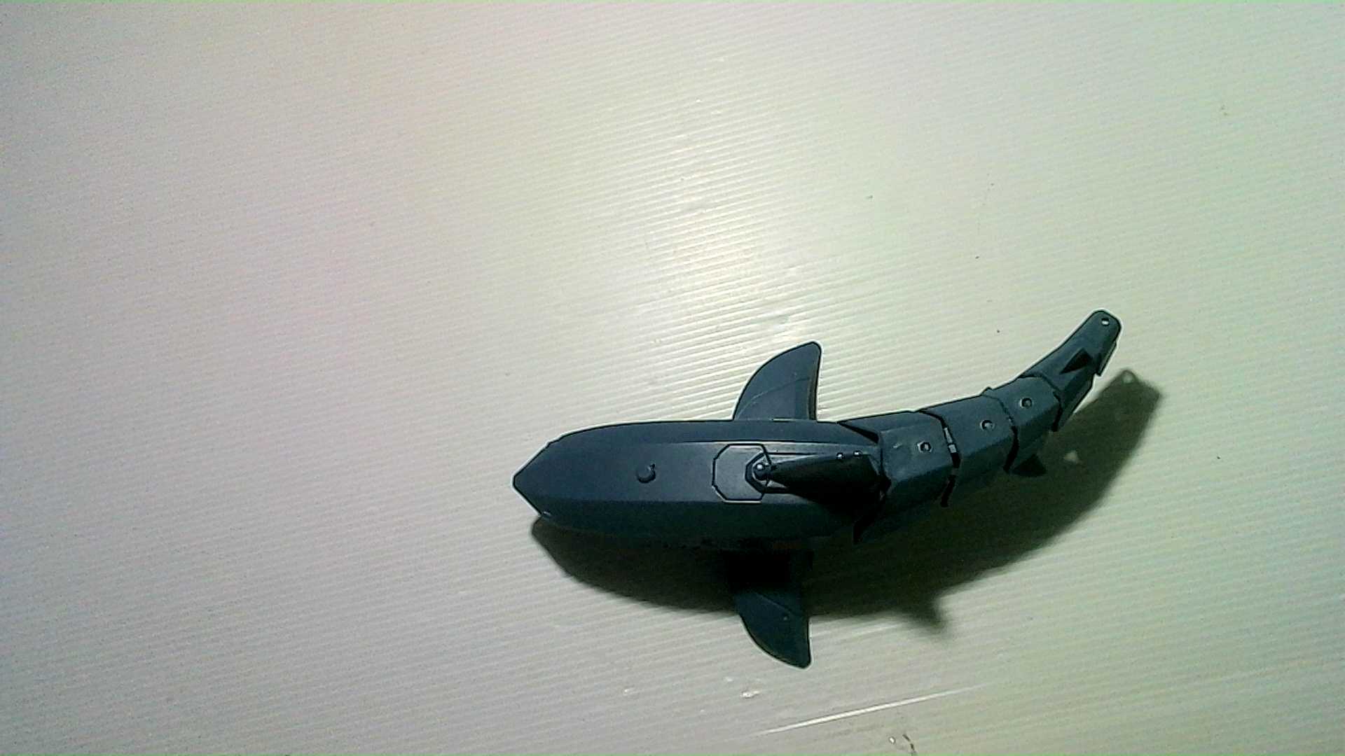 Plastic toy in the form of a bionic shark