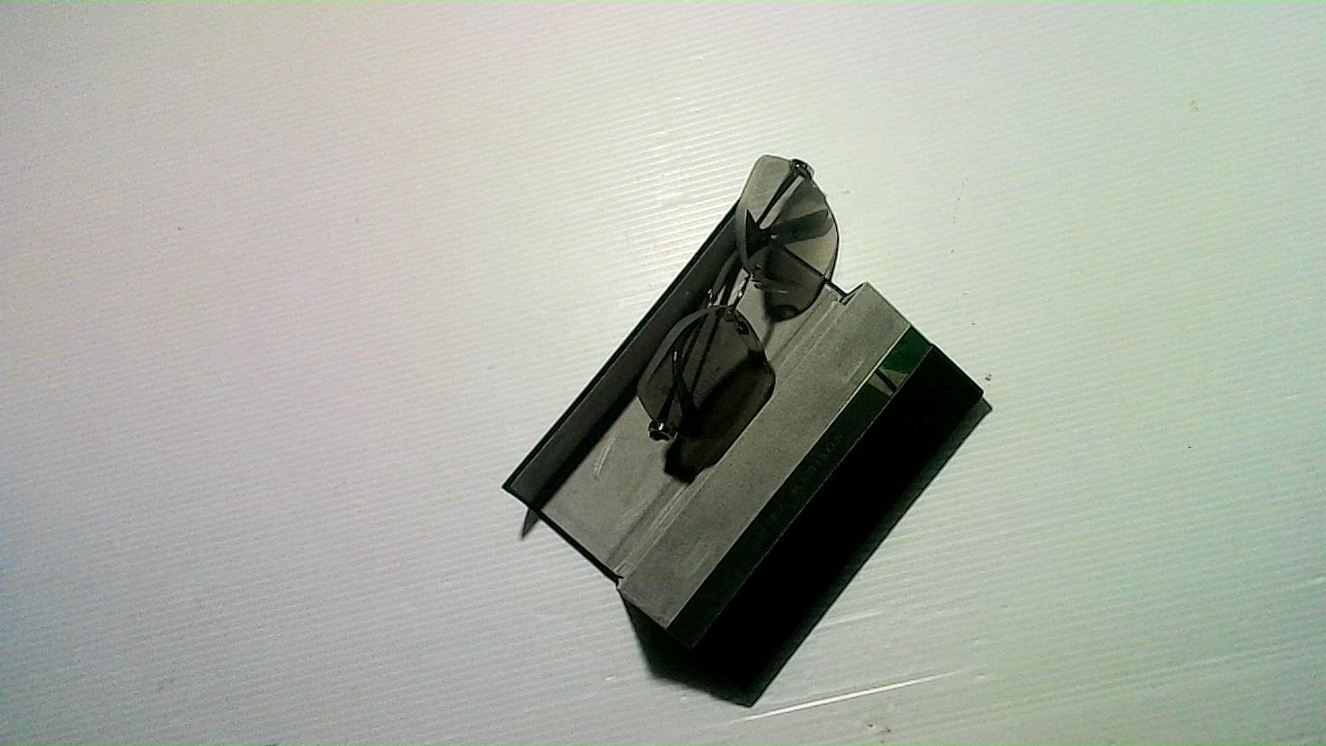 Mira Madison sunglasses in a leather case