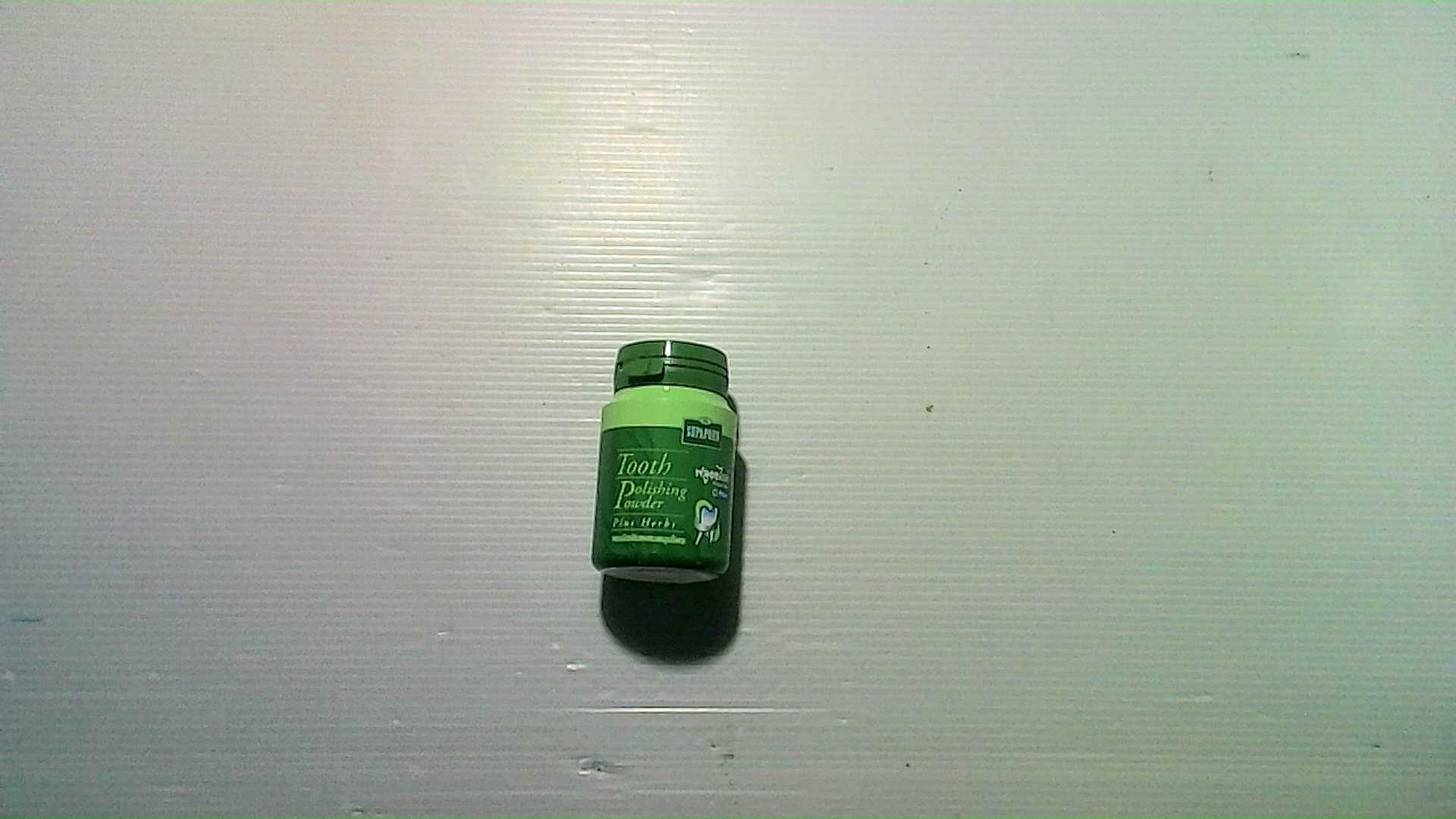 Herbal teeth polishing powder from Supaporn.
